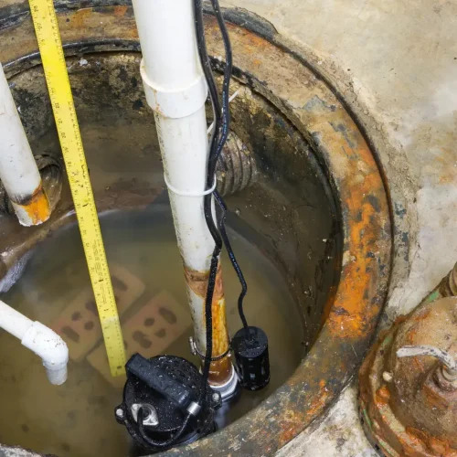 Professional sump pump installation in Oakville to prevent basement flooding.